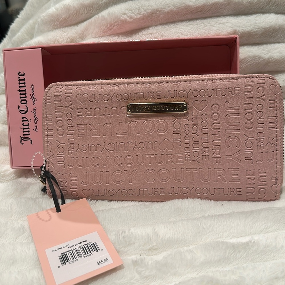 NWT Juicy Couture Baby Pink Wallet with Credit Card, Bills, and Coin slots.